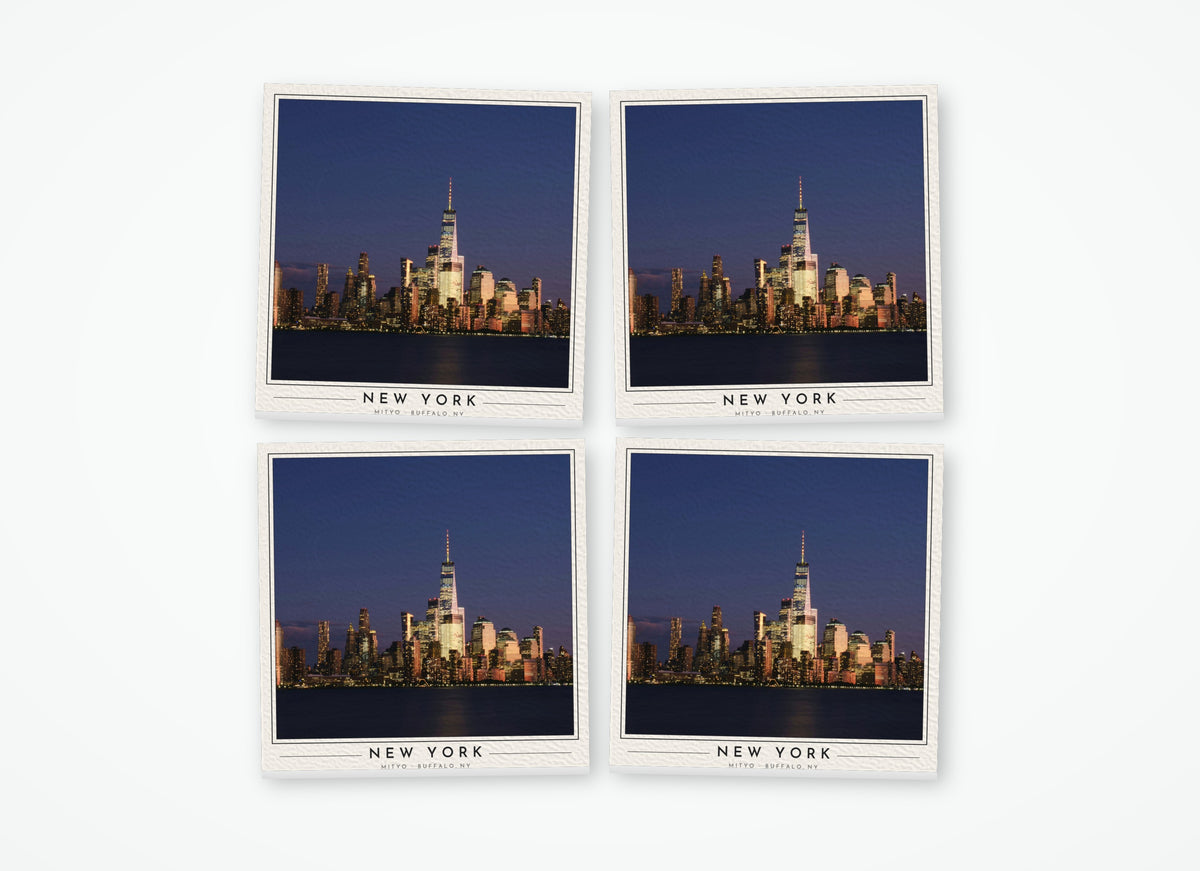 Set of 4 poster-style coasters of the Lower Manhattan skyline at night, full-color