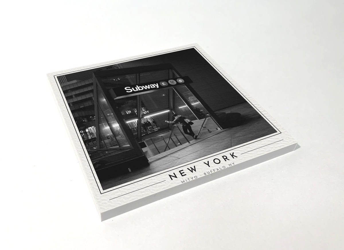 Square poster-style coaster of a New York City subway entrance, black-and-white
