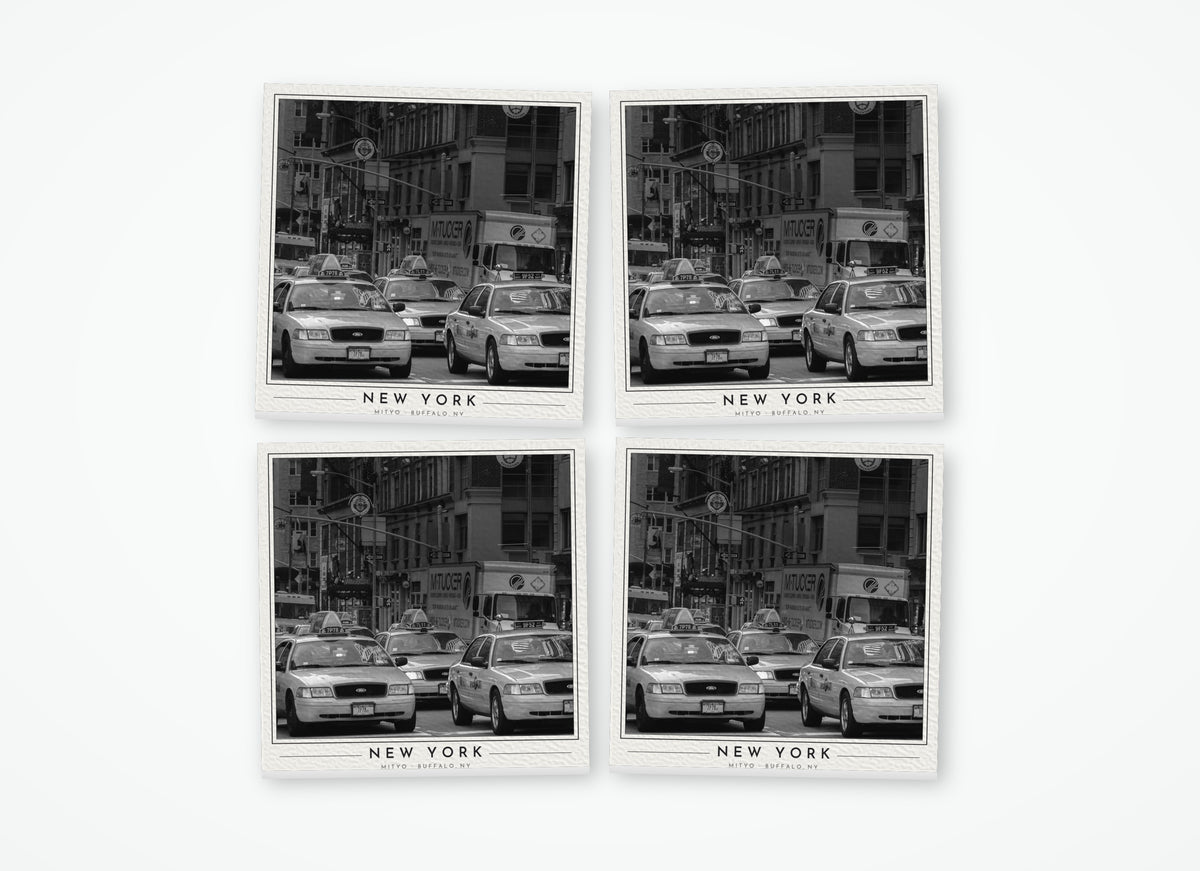 Set of 4 poster-style coasters of a line of yellow NYC taxi cabs, black-and-white