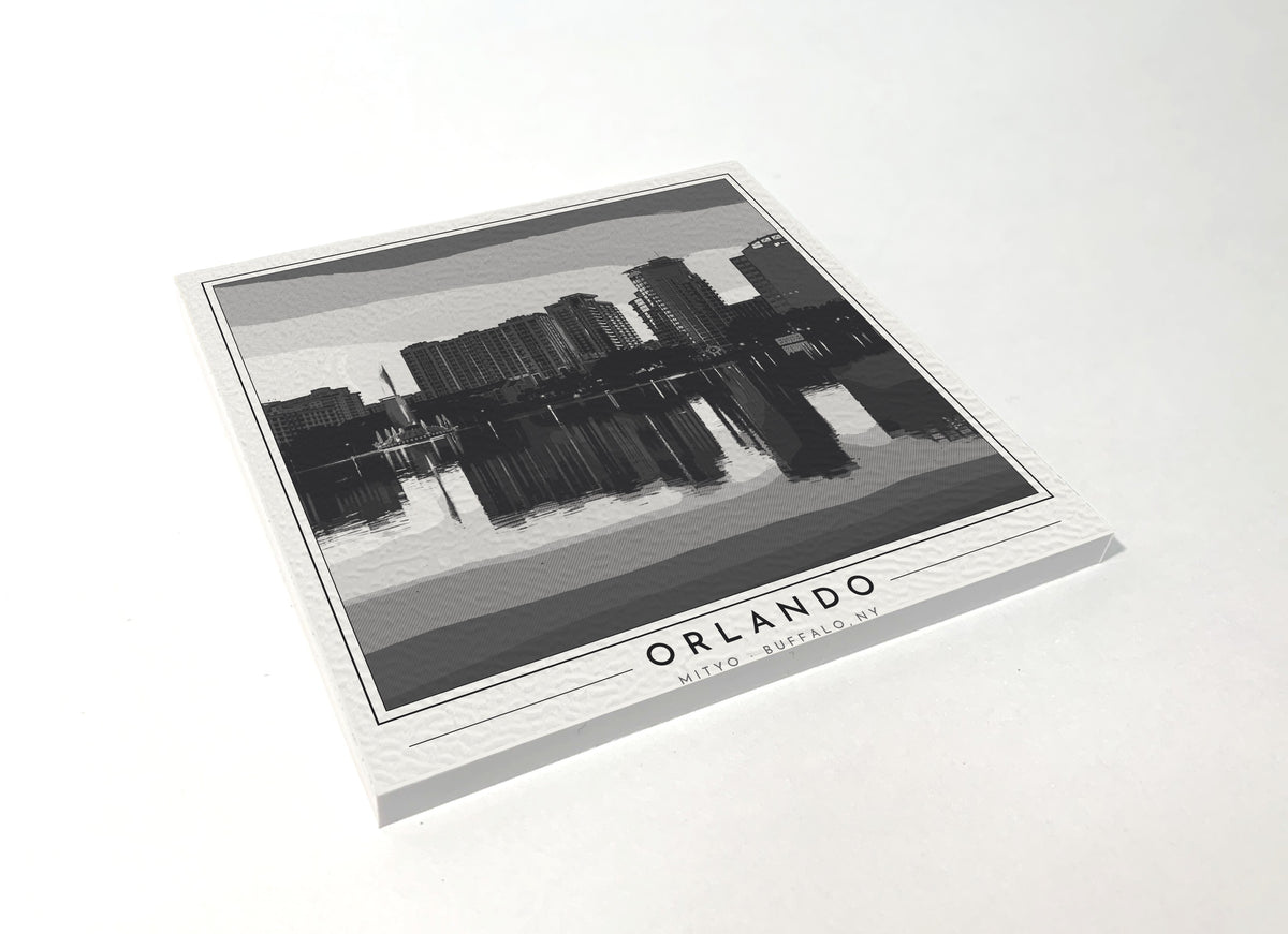 Square poster-style coaster of the downtown Orlando skyline reflected in Lake Eola, black-and-white
